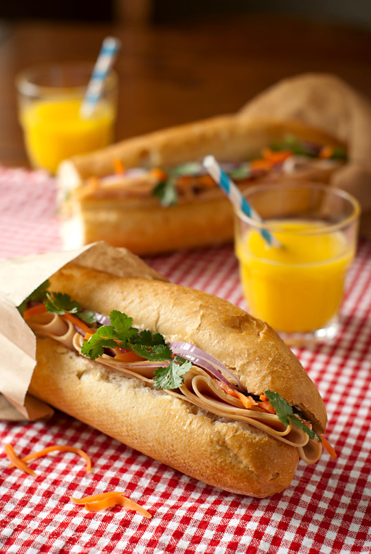 Banh Mi sandwich with orange juice