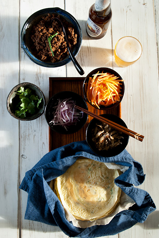 chive crêpes with miso flavoured ground beef, carrots, red onion, cilantro and sauteed mushrooms