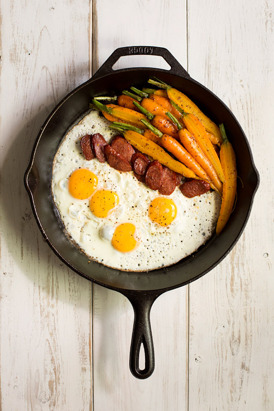 fried eggs with chorizo and glazed carrots